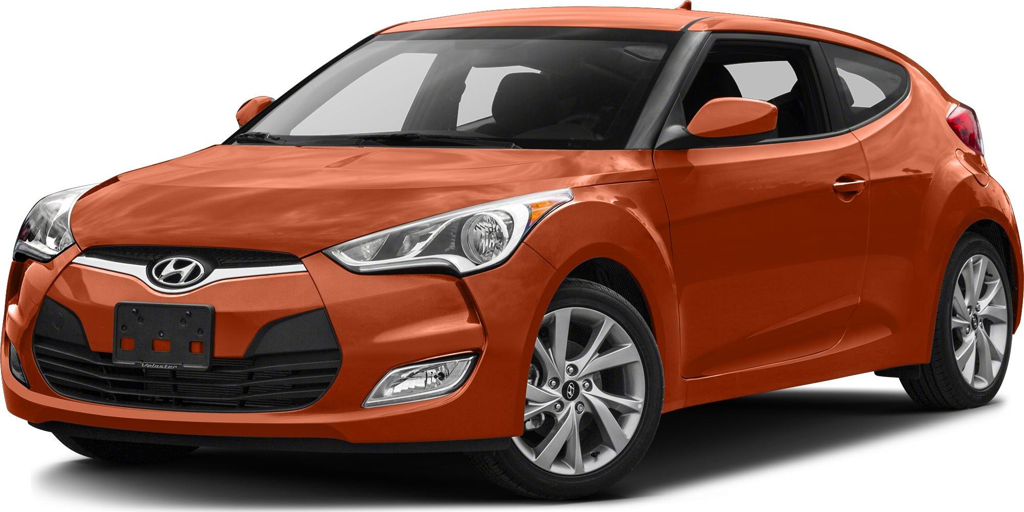 Orange compact hatchback with distinctive front grille and headlights