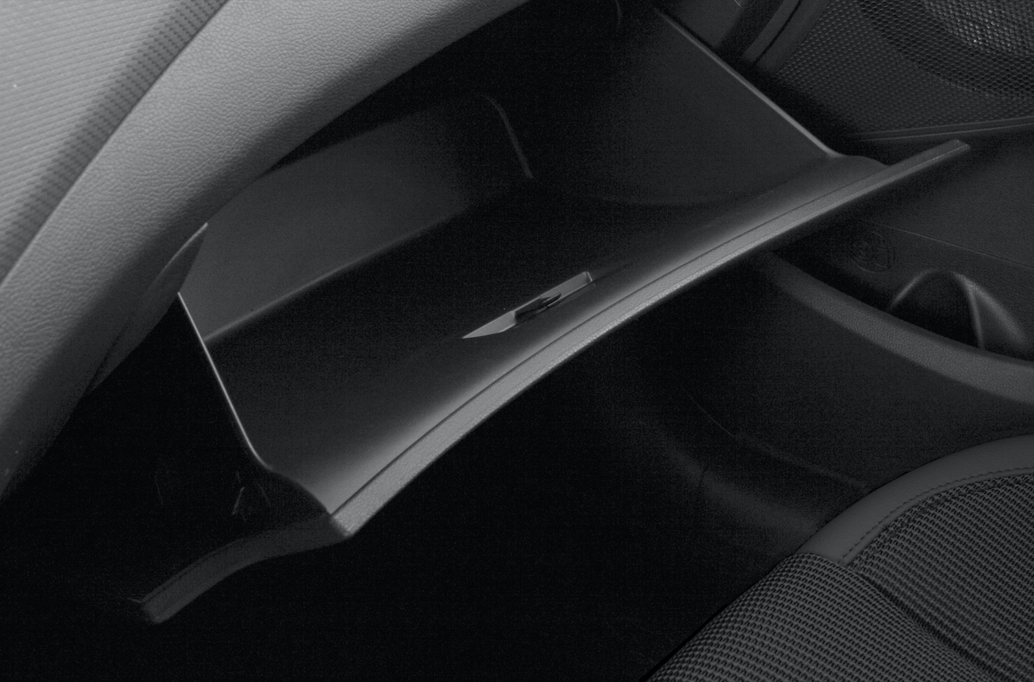 Open glove compartment storage in car interior
