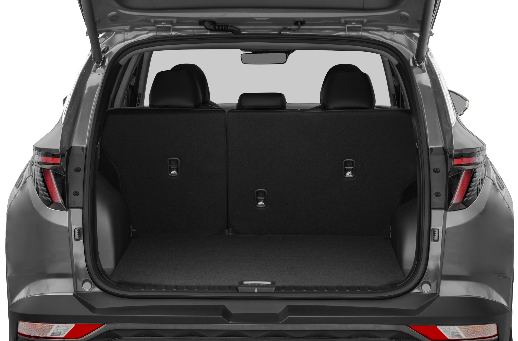 SUV rear cargo space with open tailgate and rear seats