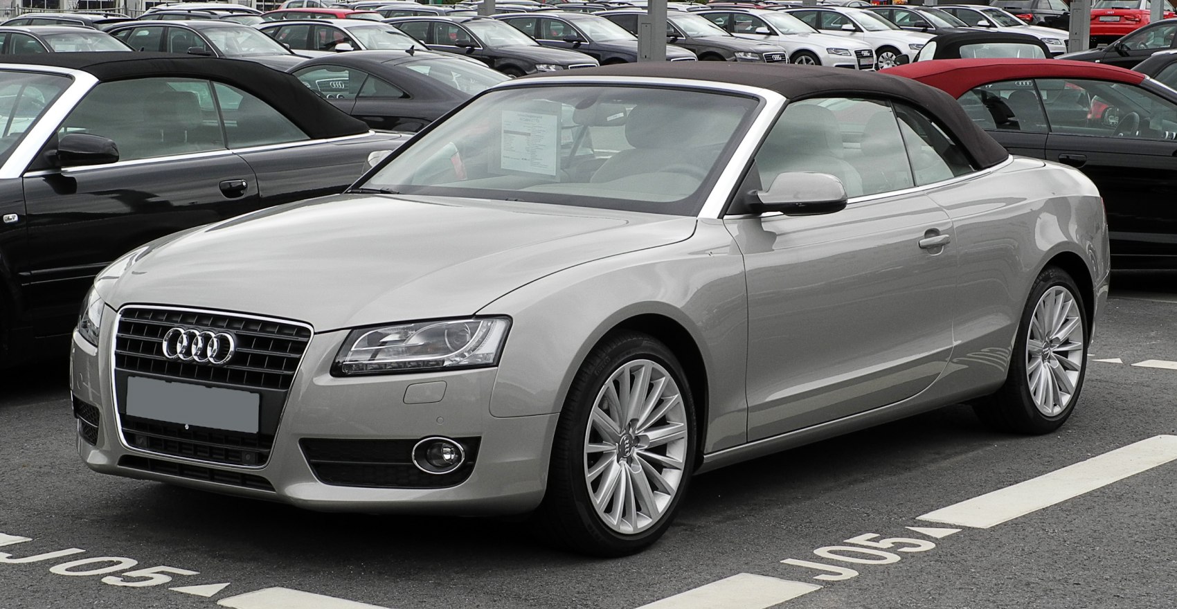 Silver soft-top convertible with LED headlights and alloy wheels