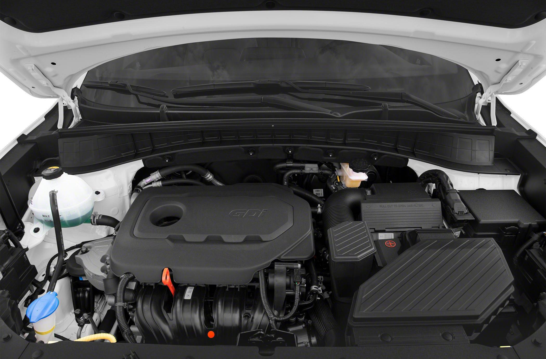 Engine bay with GDI engine cover and component layout