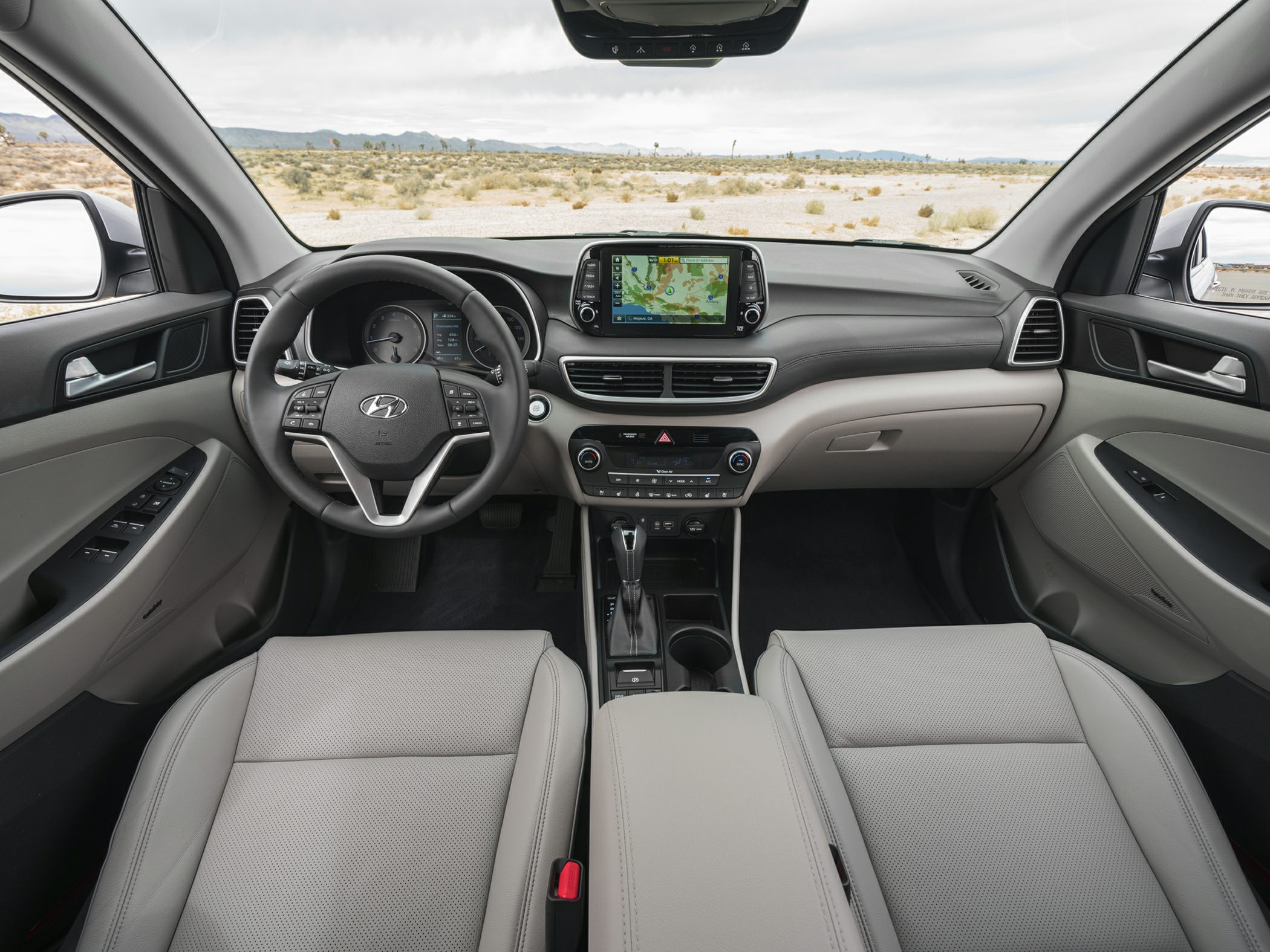 Modern SUV interior with touchscreen navigation and ergonomic dashboard