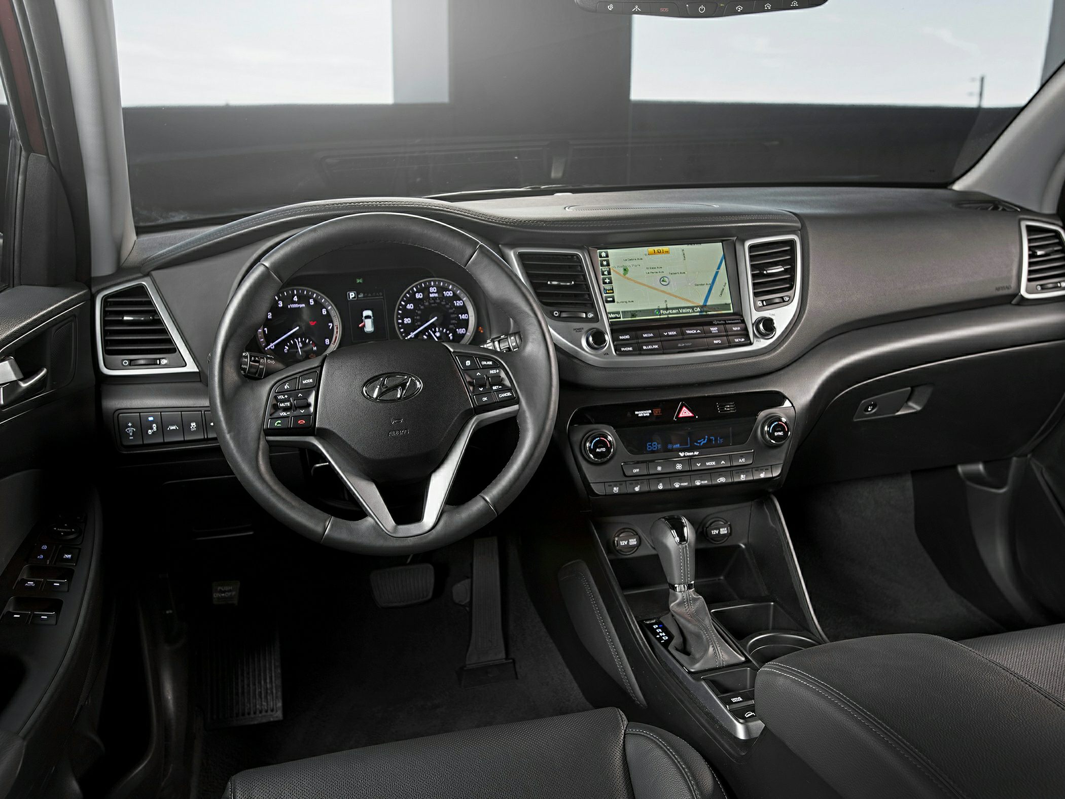 Dashboard with steering wheel controls and infotainment system