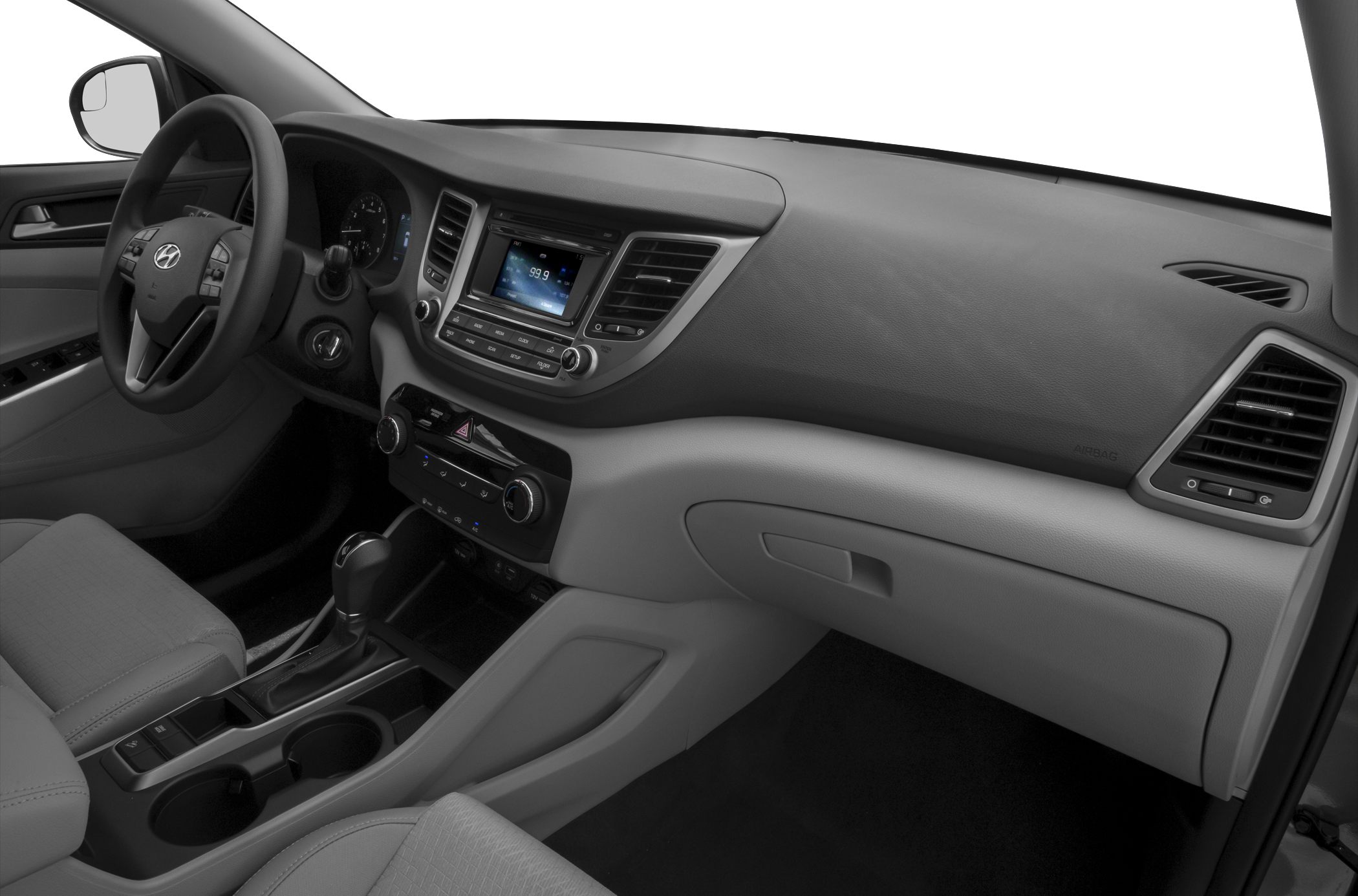 Modern vehicle interior with dashboard, infotainment, and center console.