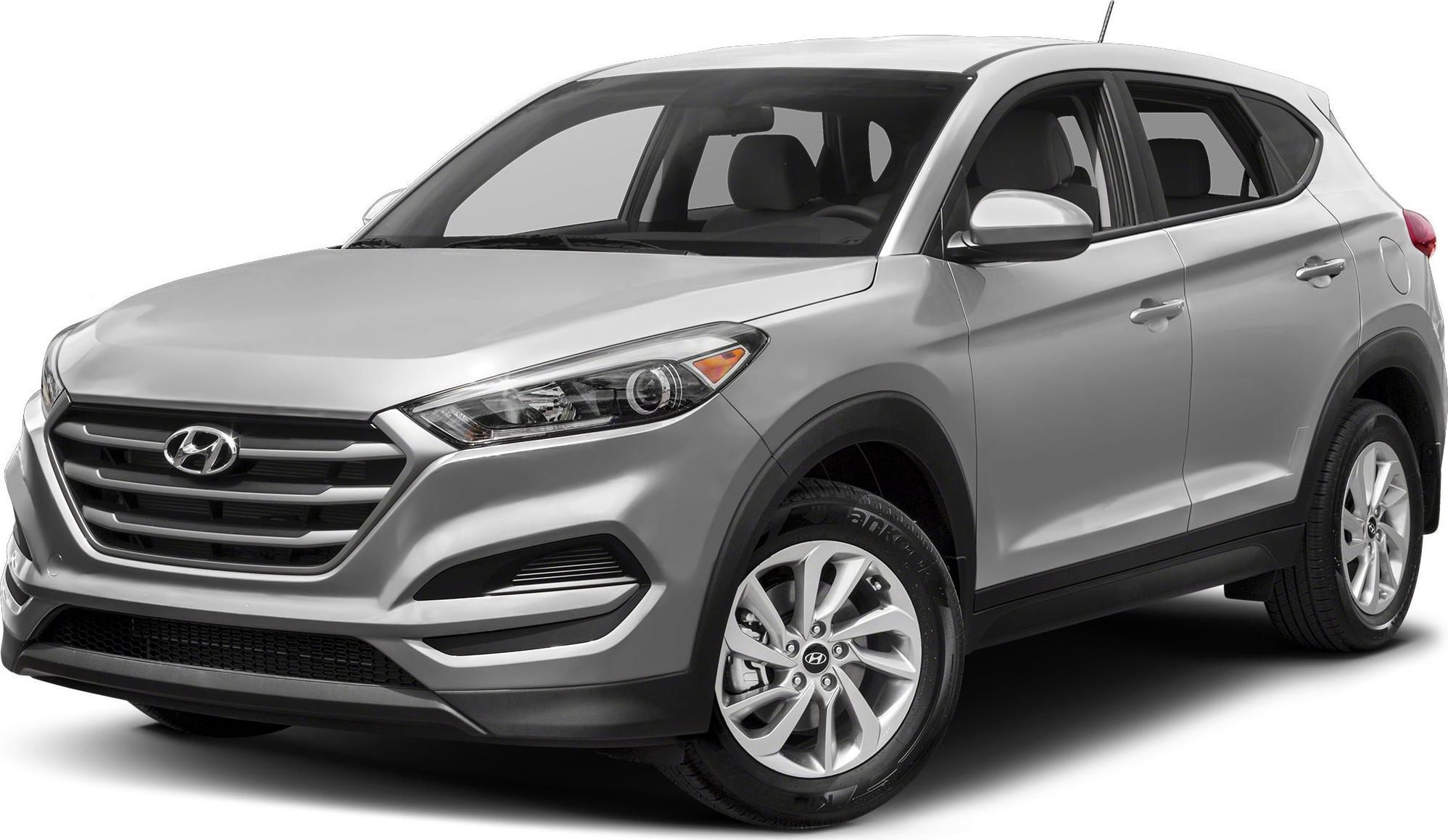 Front side view of silver SUV with modern alloy wheels
