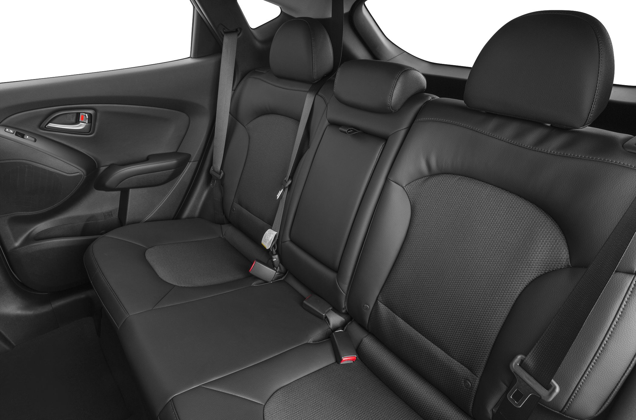 Rear seats with black leather upholstery and integrated headrests.