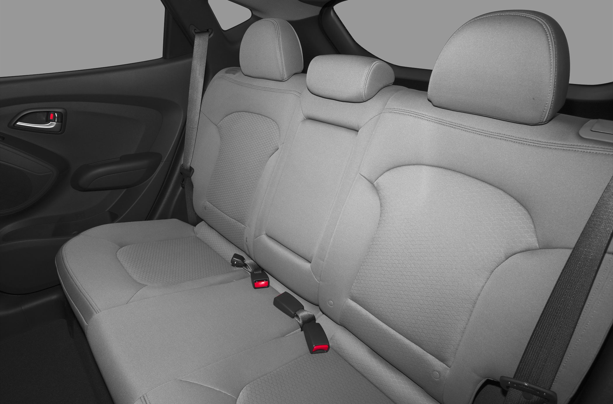 Rear seat interior with headrests and seat belts