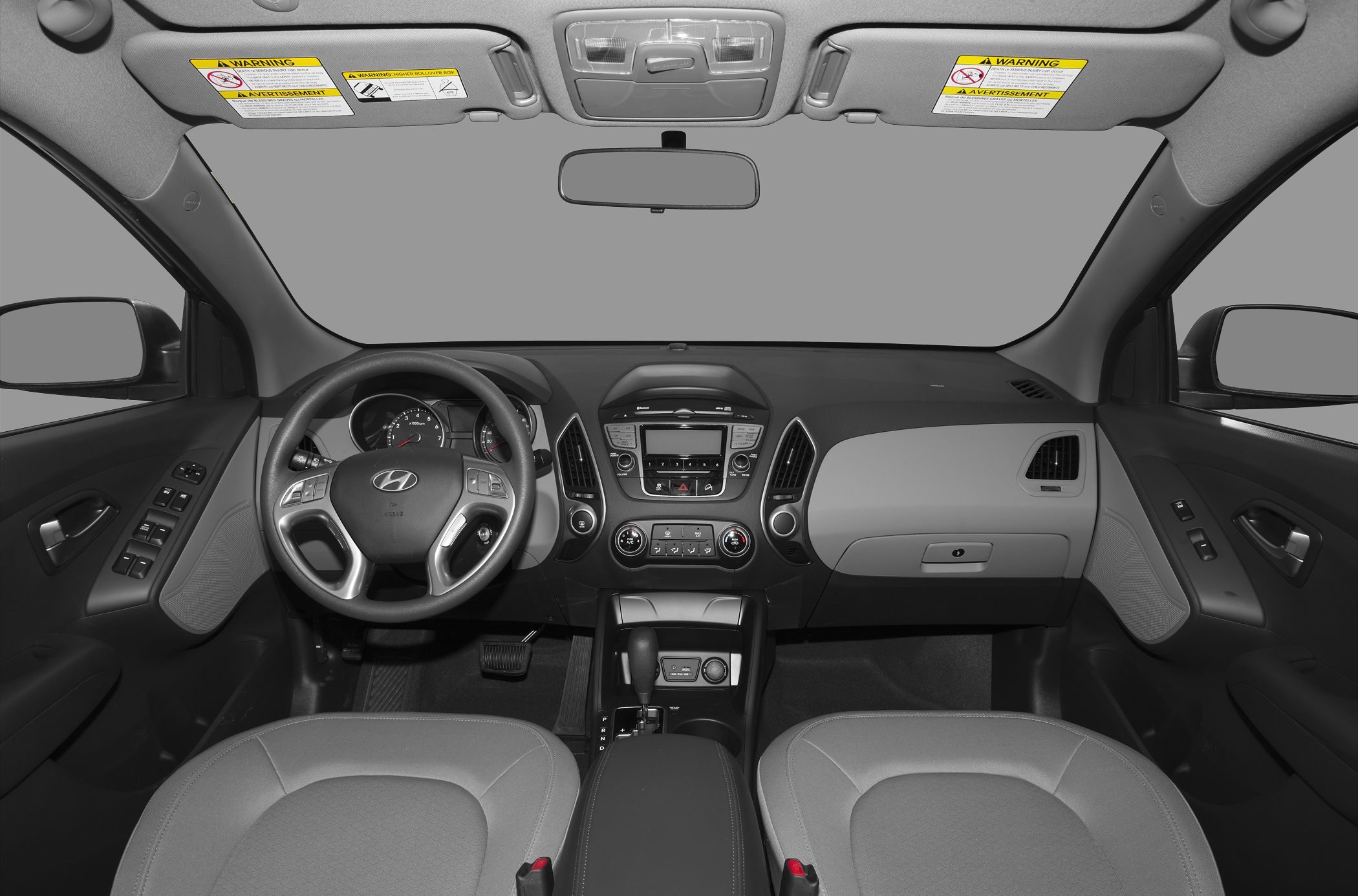 Dashboard, steering wheel, center console view of SUV interior