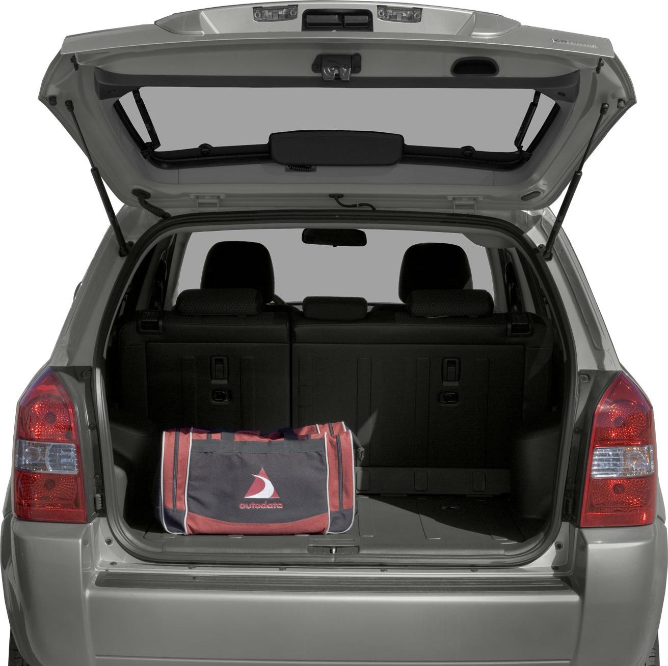 Open rear hatch showing spacious cargo area with bag