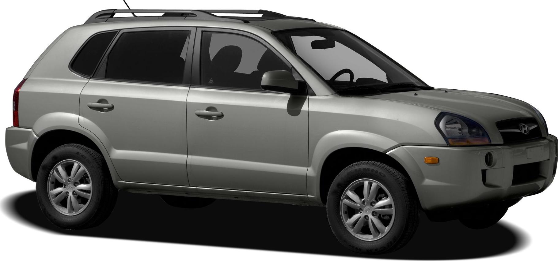 Side profile of SUV with five-spoke wheels and side mirror