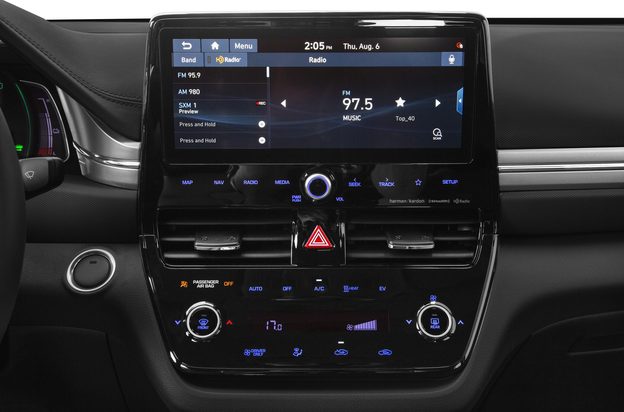 Infotainment touchscreen and climate control panel with digital display and control knobs
