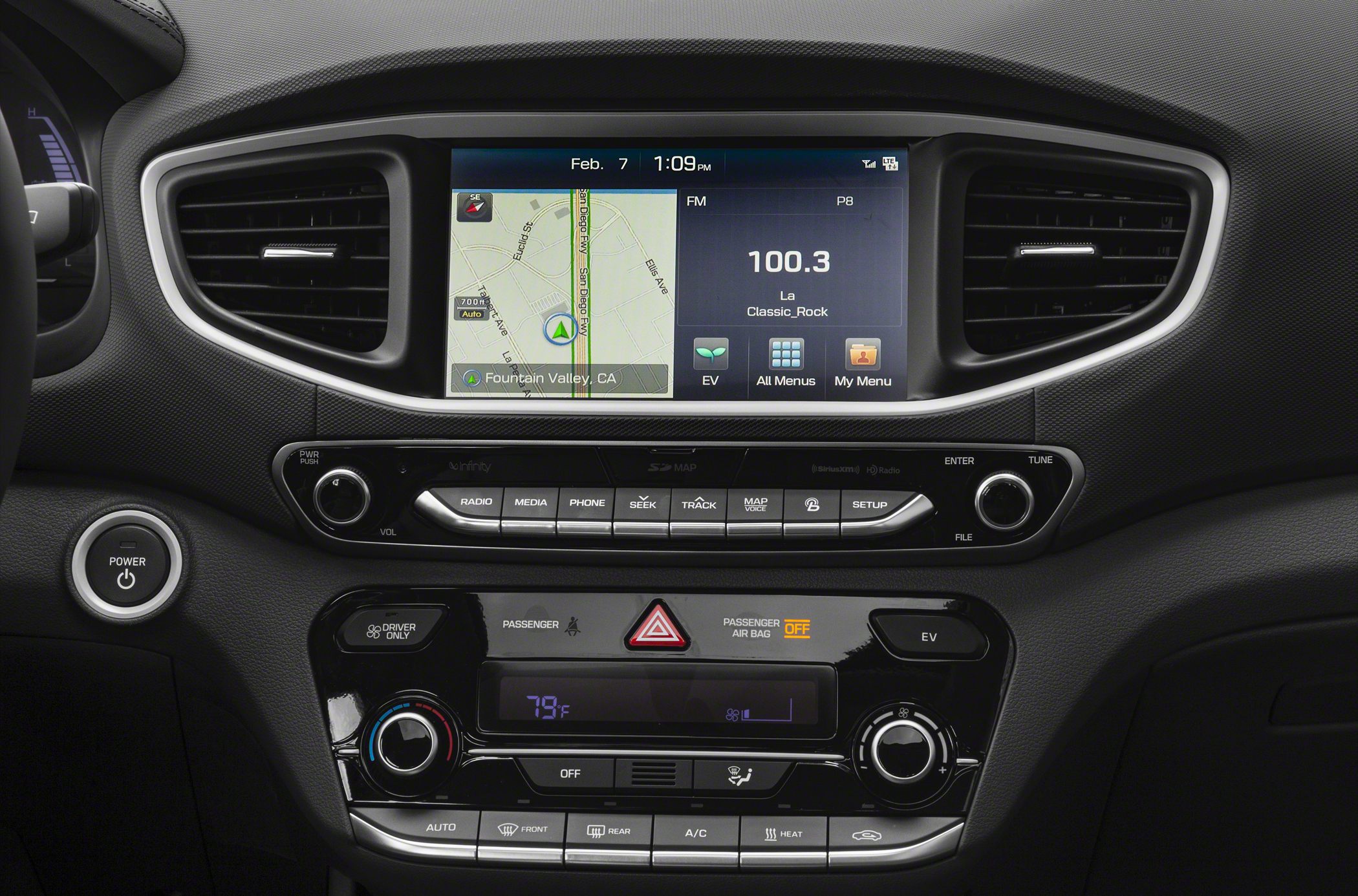 Touchscreen infotainment system and climate control panel in car interior