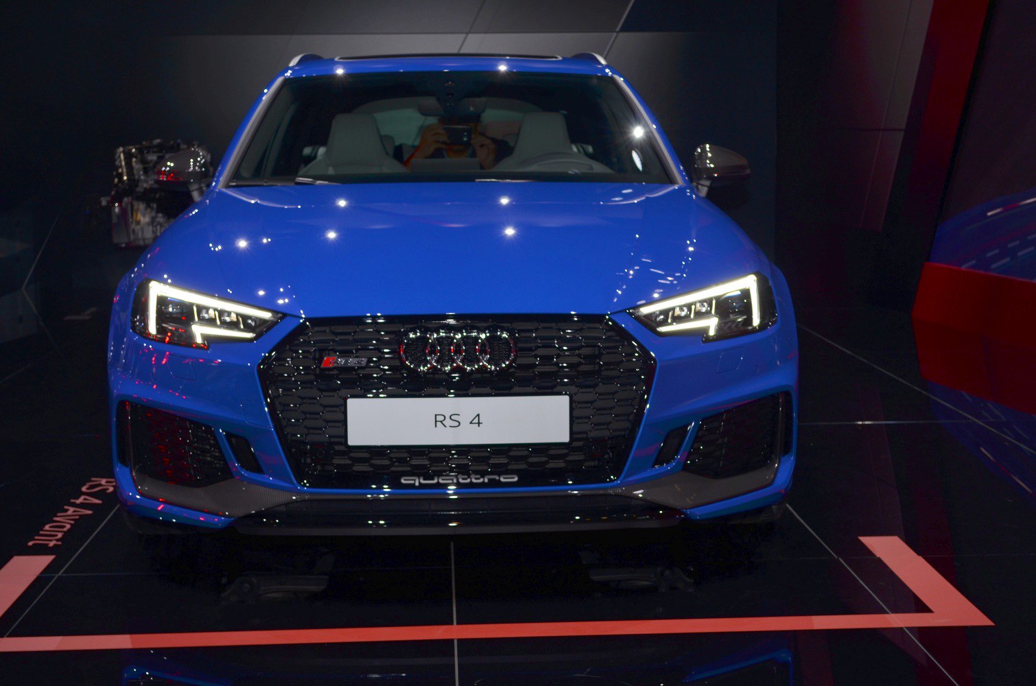 Front view with LED headlights and honeycomb grille in blue sport wagon