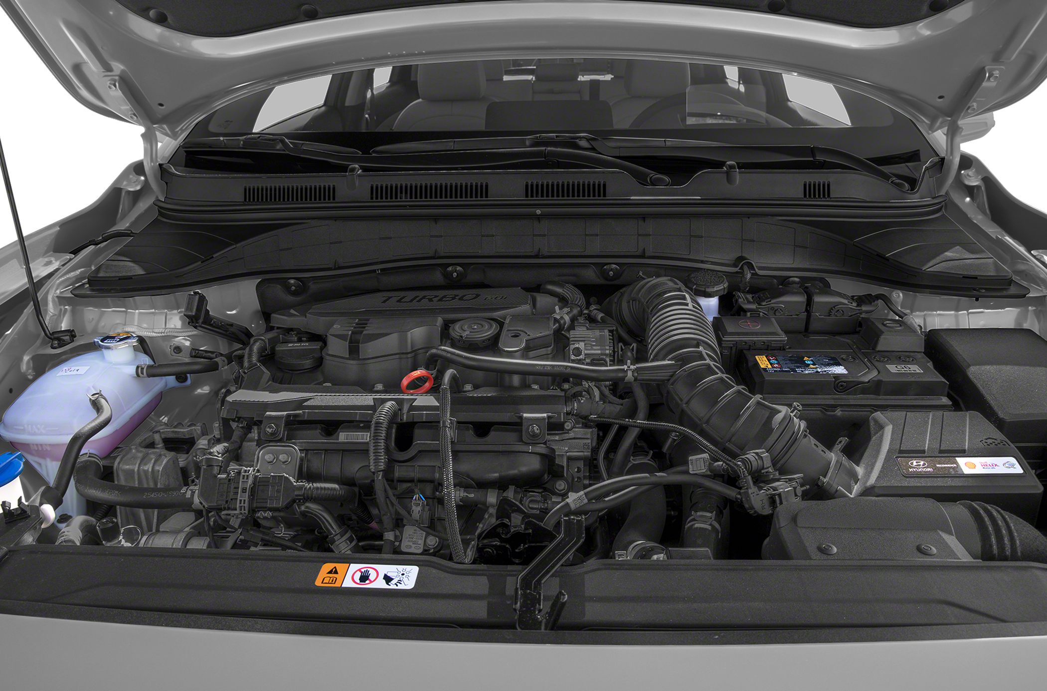 Turbocharged engine compartment with air intake and fluid reservoirs