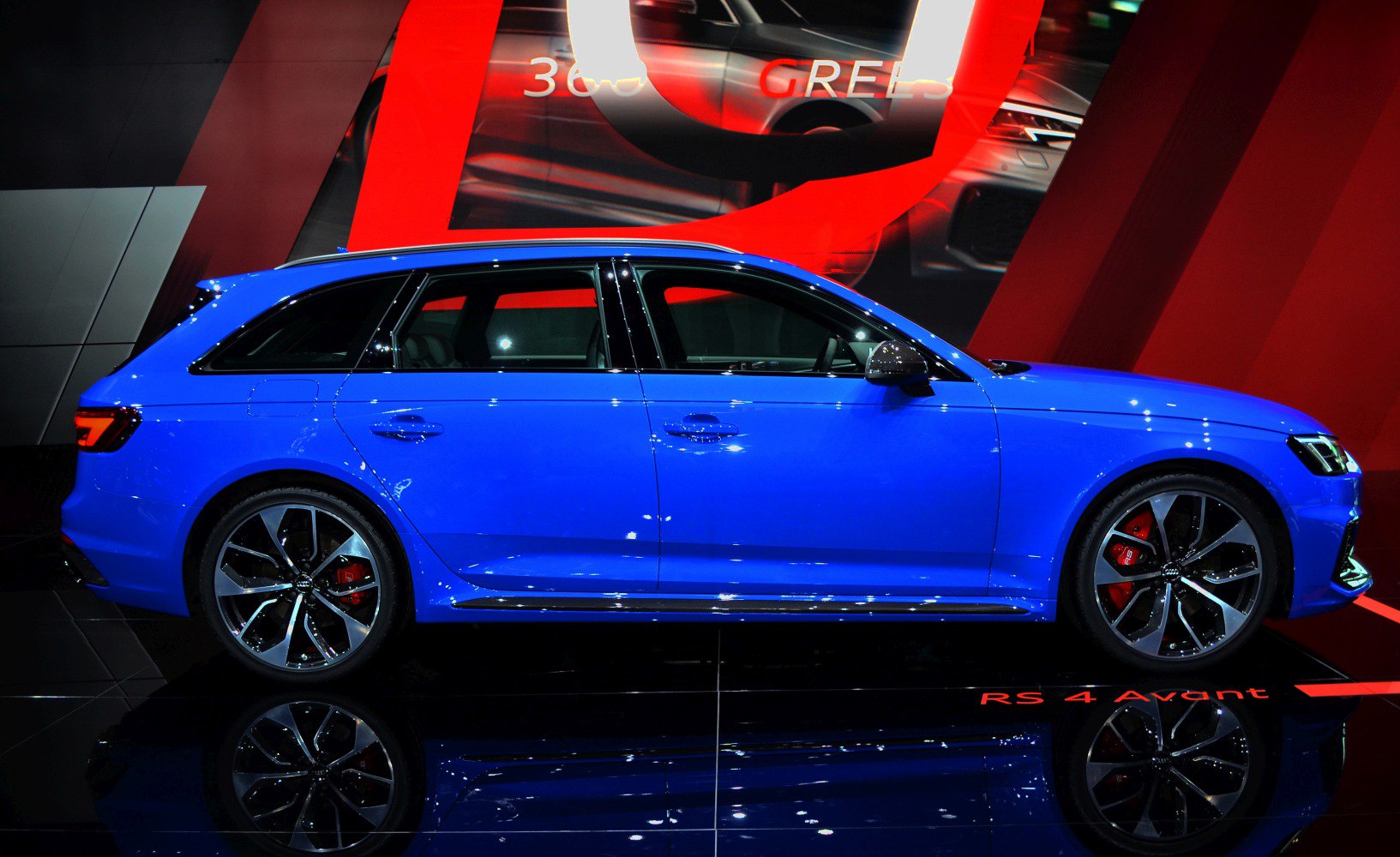 Sport wagon side profile with alloy wheels and red brake calipers