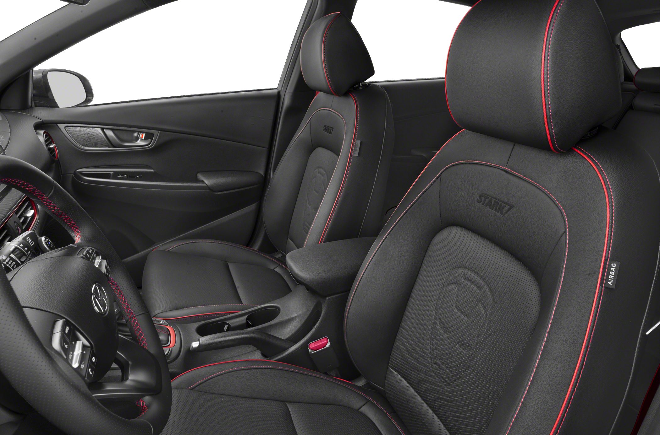 Black leather car seats with red stitching and Stark embossed logo