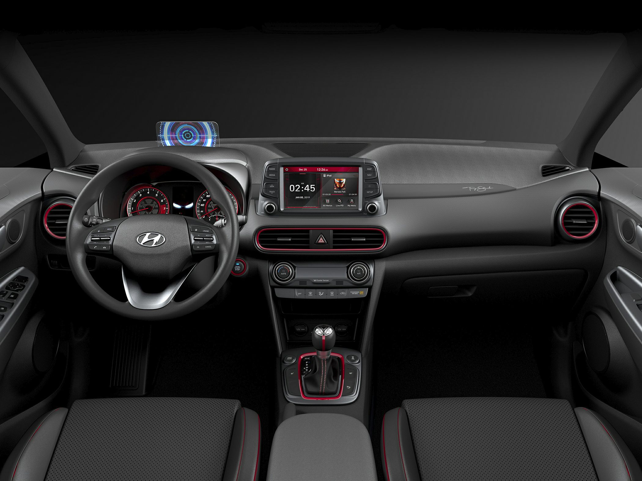 Modern car interior with infotainment screen and red-accented dashboard