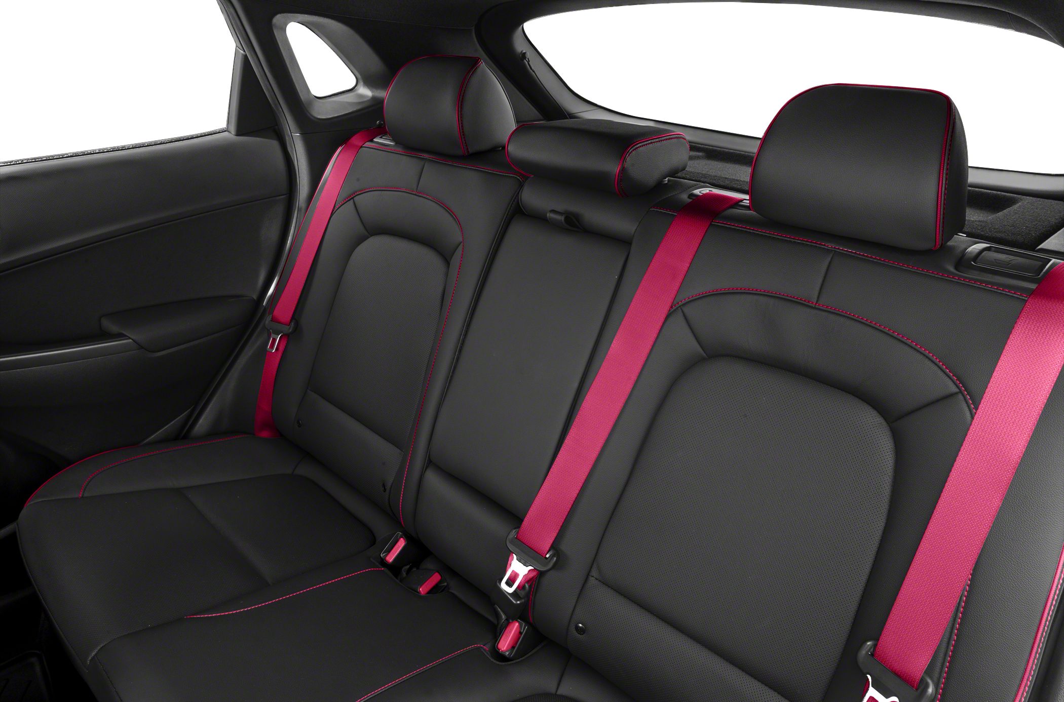 Rear seats with black leather upholstery, red stitching, and red seatbelts