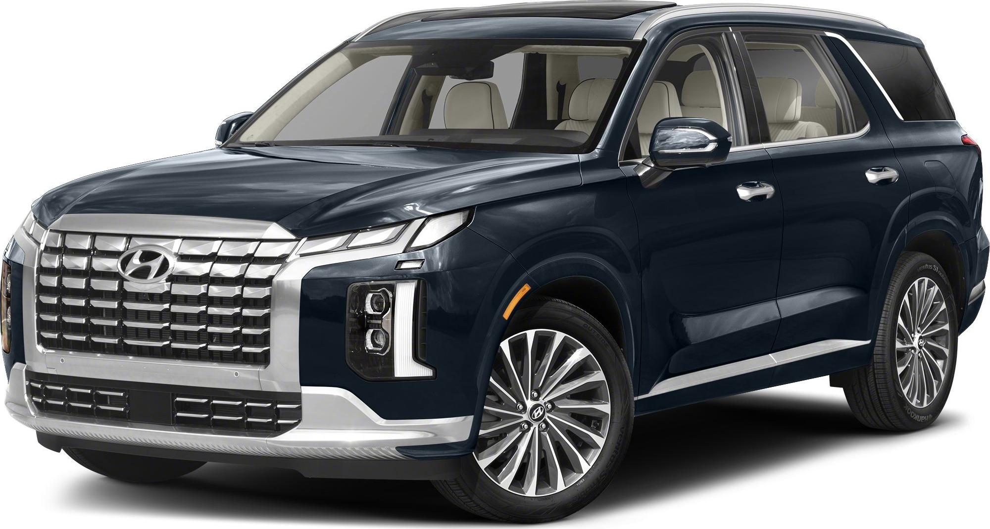Front-side view of SUV with bold grille and modern LED headlights