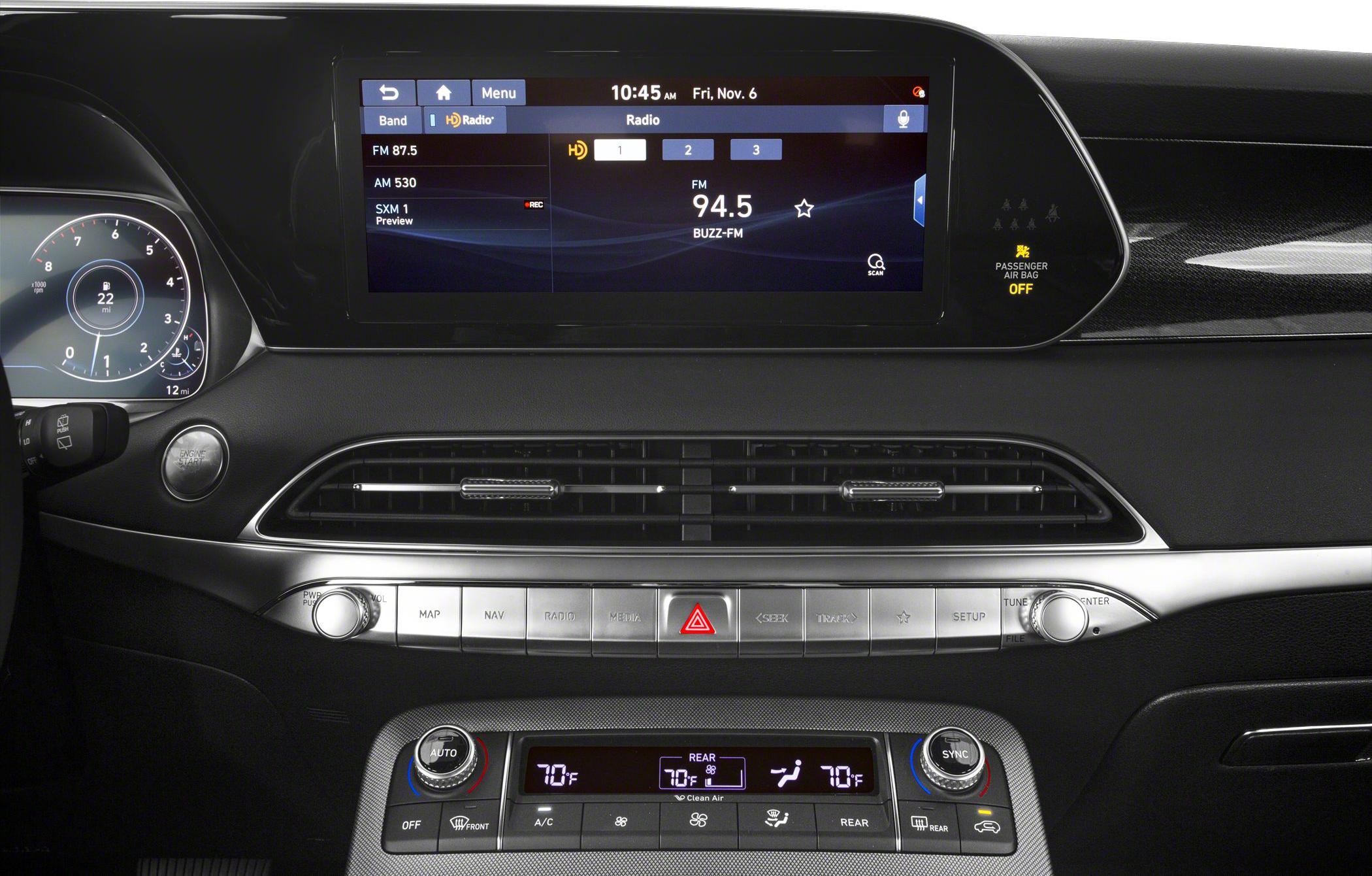 Digital dashboard, touchscreen infotainment, climate control interface