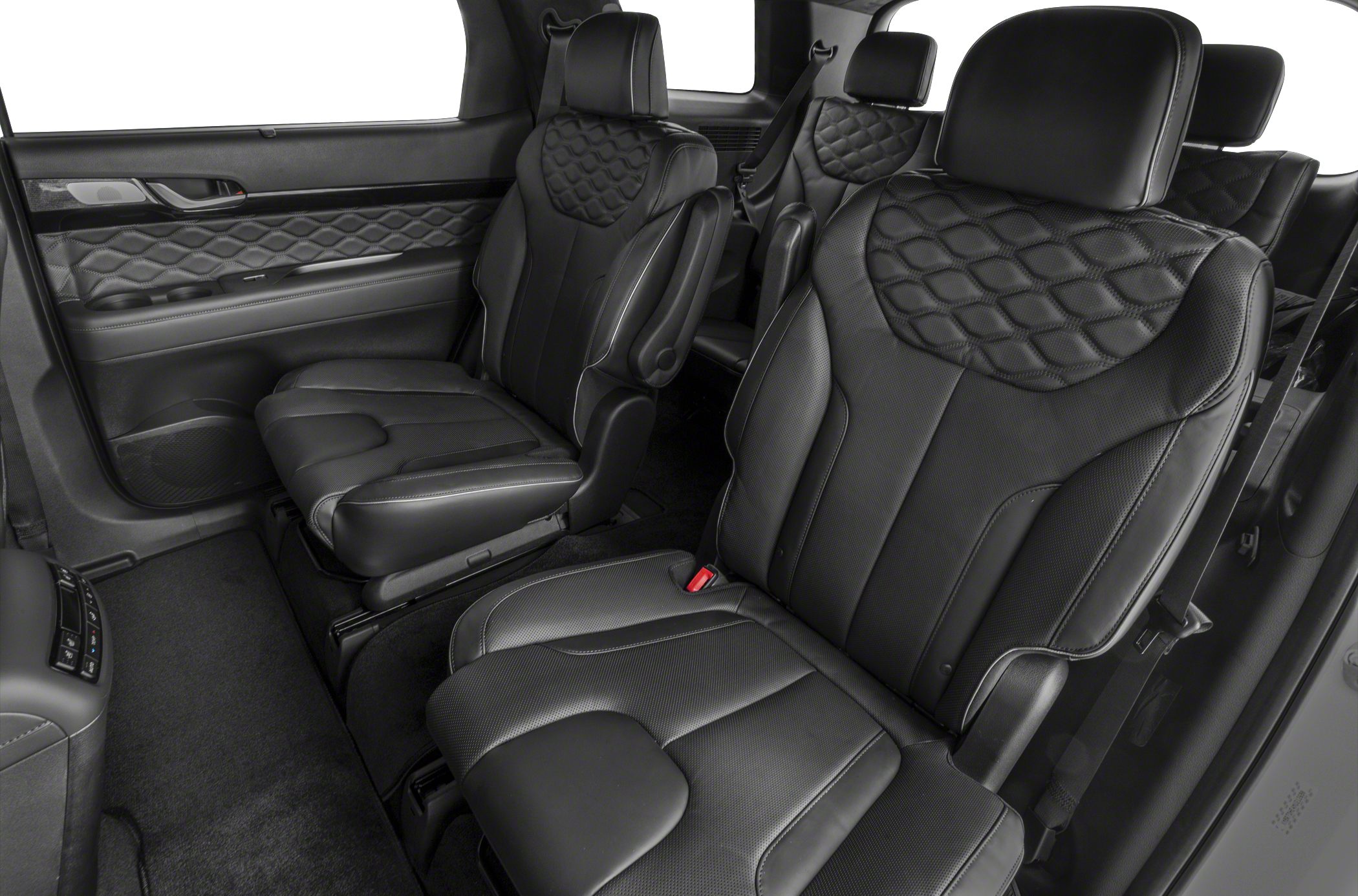 Black leather second-row captain seats with detailed stitching