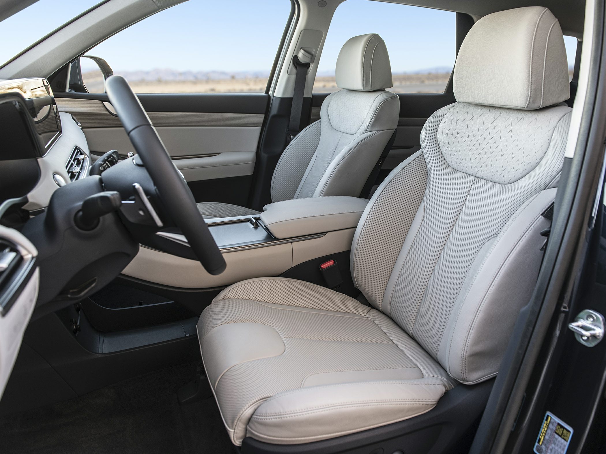 Beige leather front seats with dashboard interior