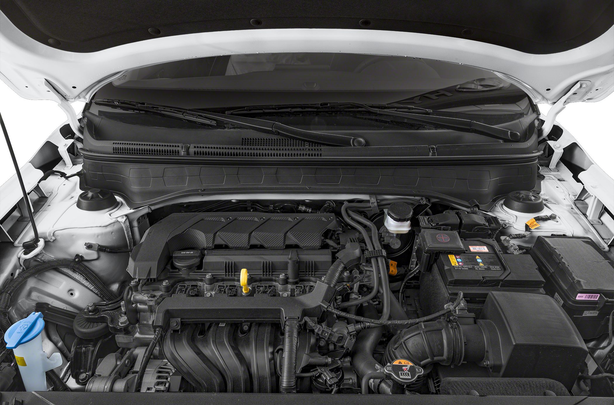 Engine bay with visible components and battery inside compact SUV