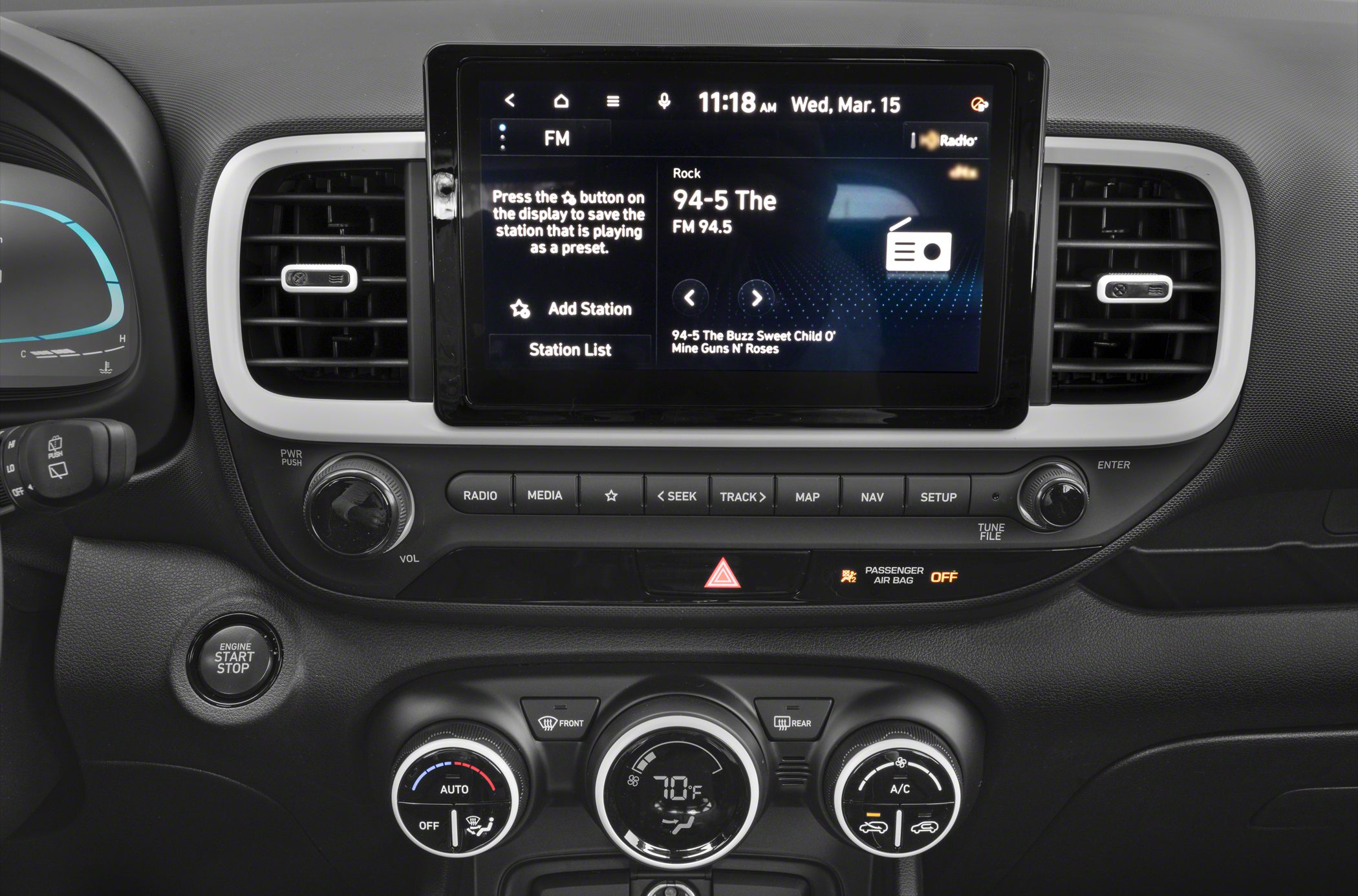 Touchscreen infotainment system and climate control dials