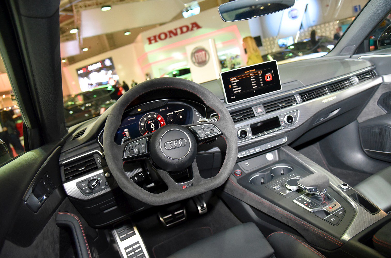 Steering wheel, digital gauge cluster, and carbon fiber dashboard