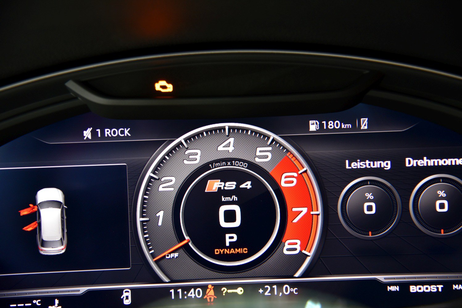 Digital instrument cluster with tachometer and dynamic mode display