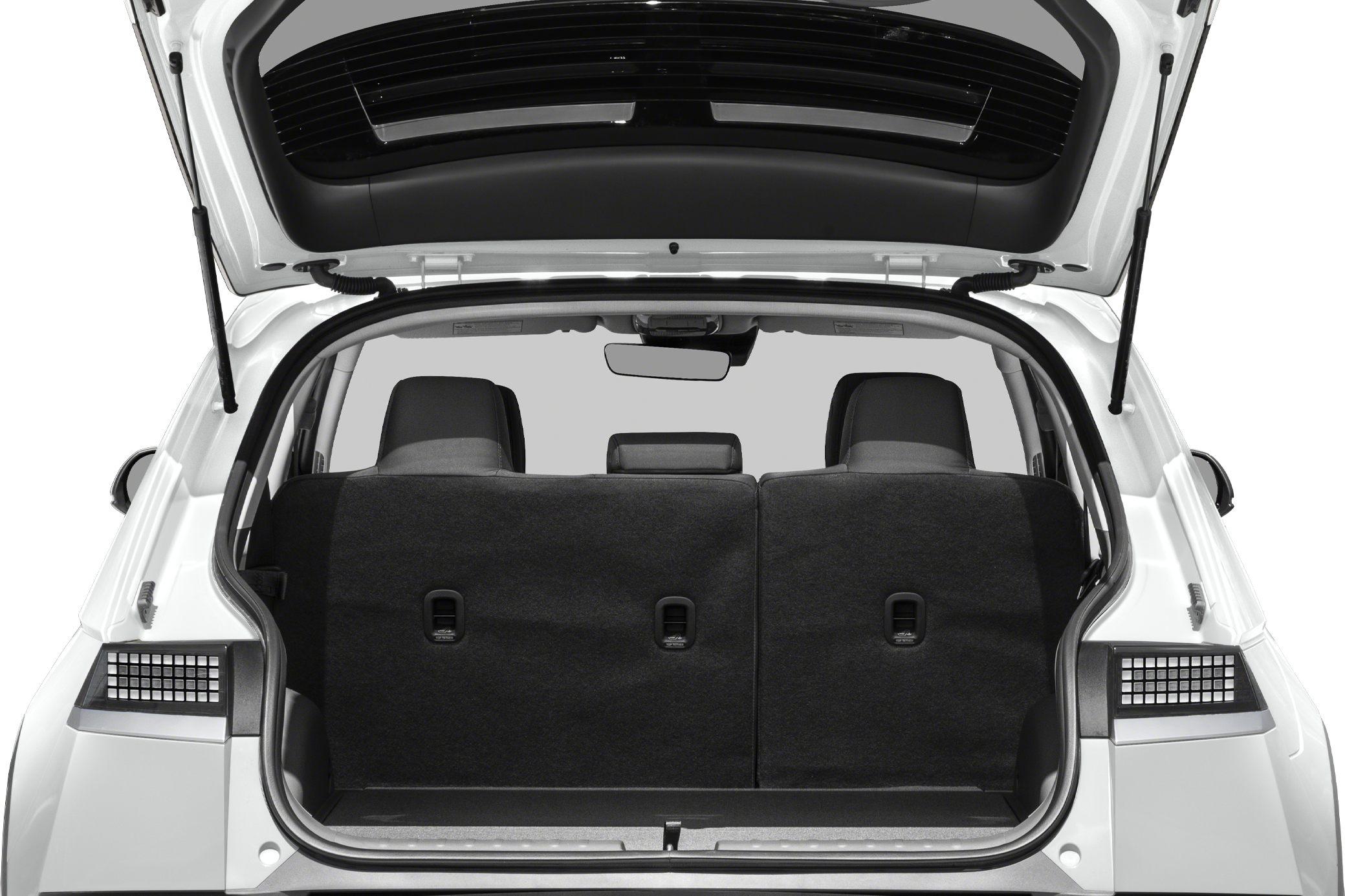 Open rear trunk with visible rear seats in hatchback