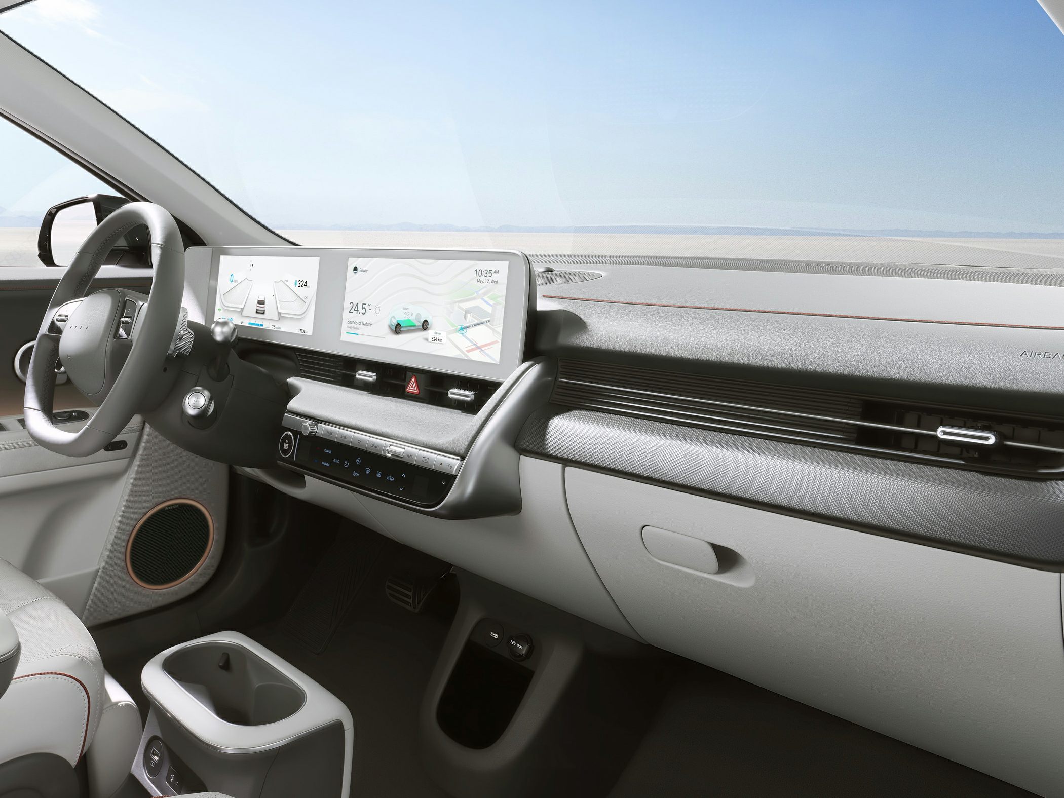 Modern electric vehicle interior with dual digital dashboard displays and minimalistic design