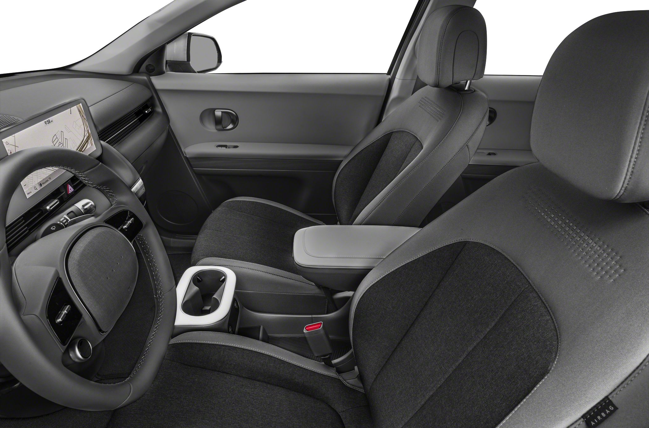 Modern car interior with digital dashboard and ergonomic front seats