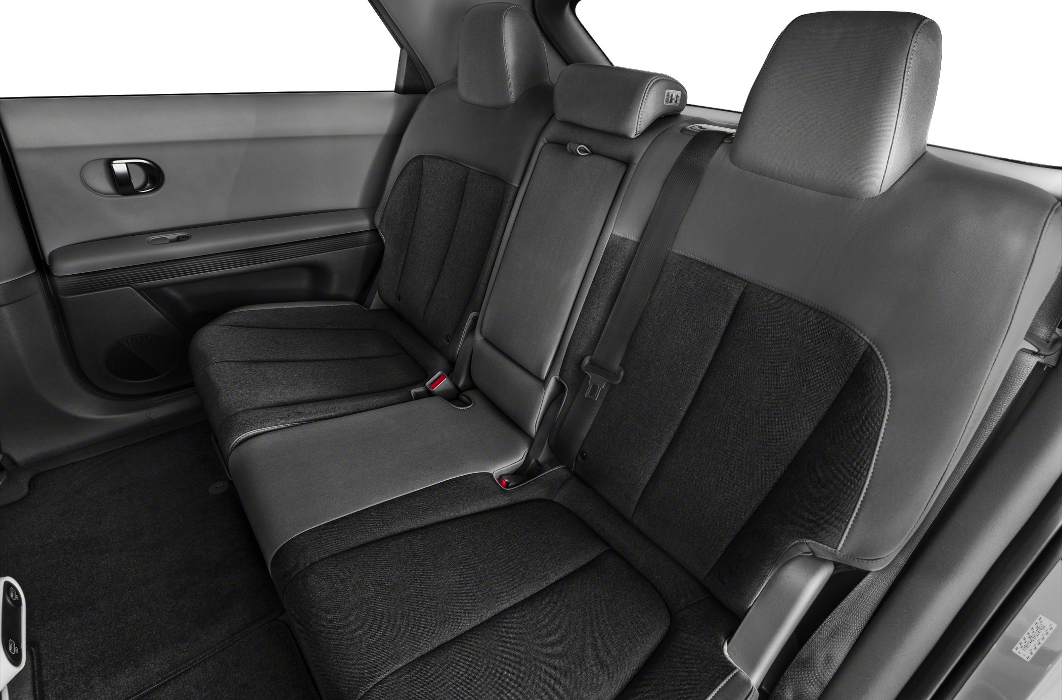Spacious rear seats with fabric and leather upholstery and integrated headrests
