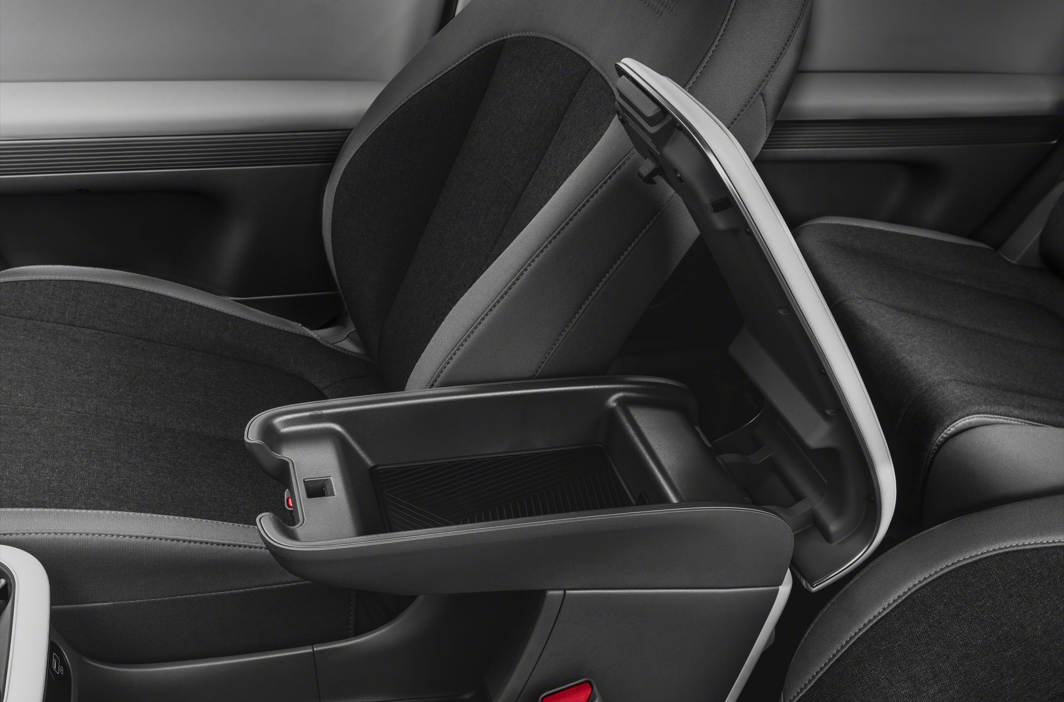 Center console storage compartment with armrest in car interior