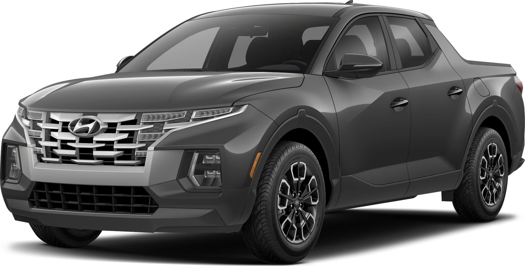 Front angled view of vehicle with distinctive grille and LED headlights