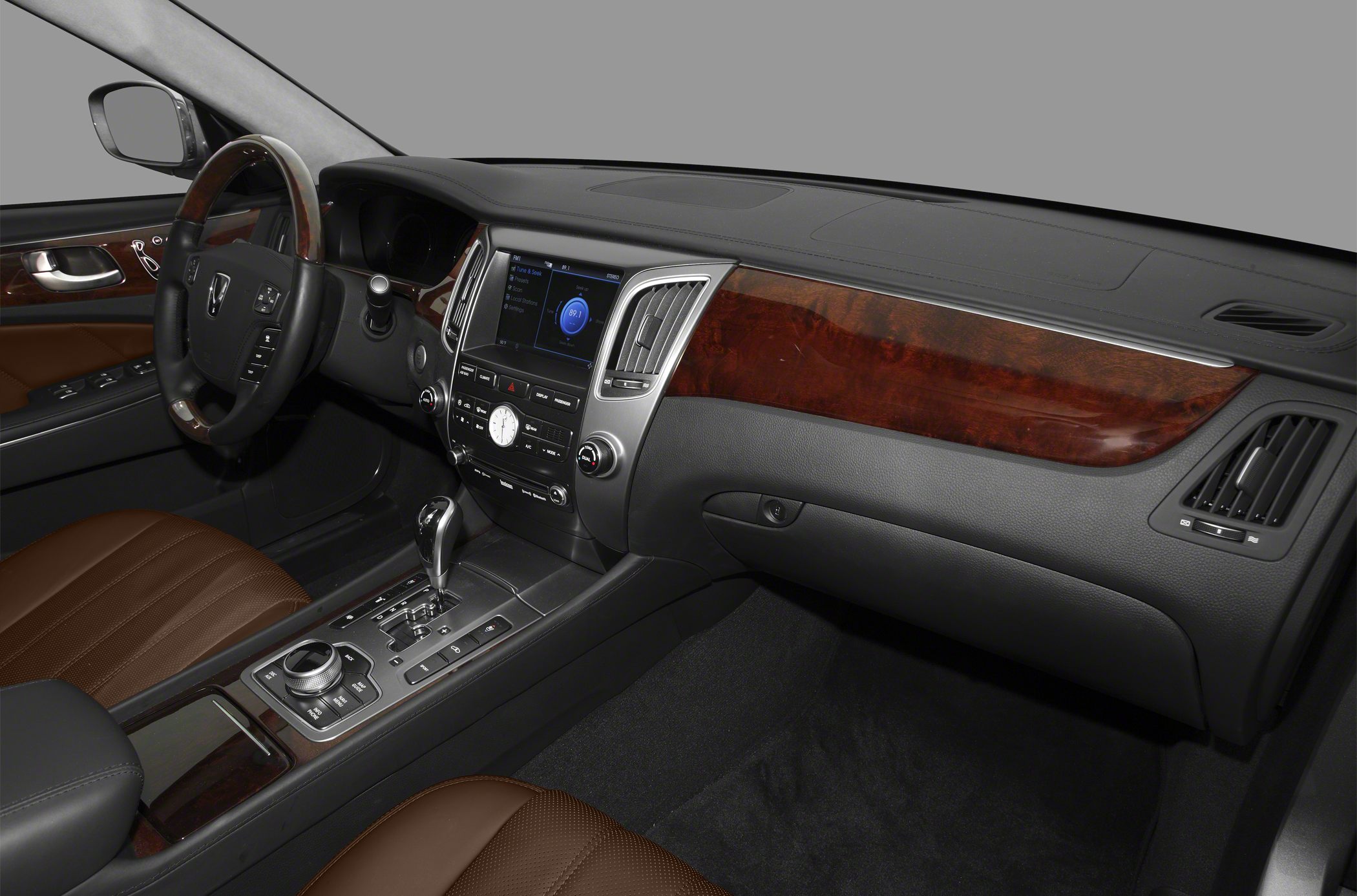 Luxury wood trim dashboard and center console with advanced controls