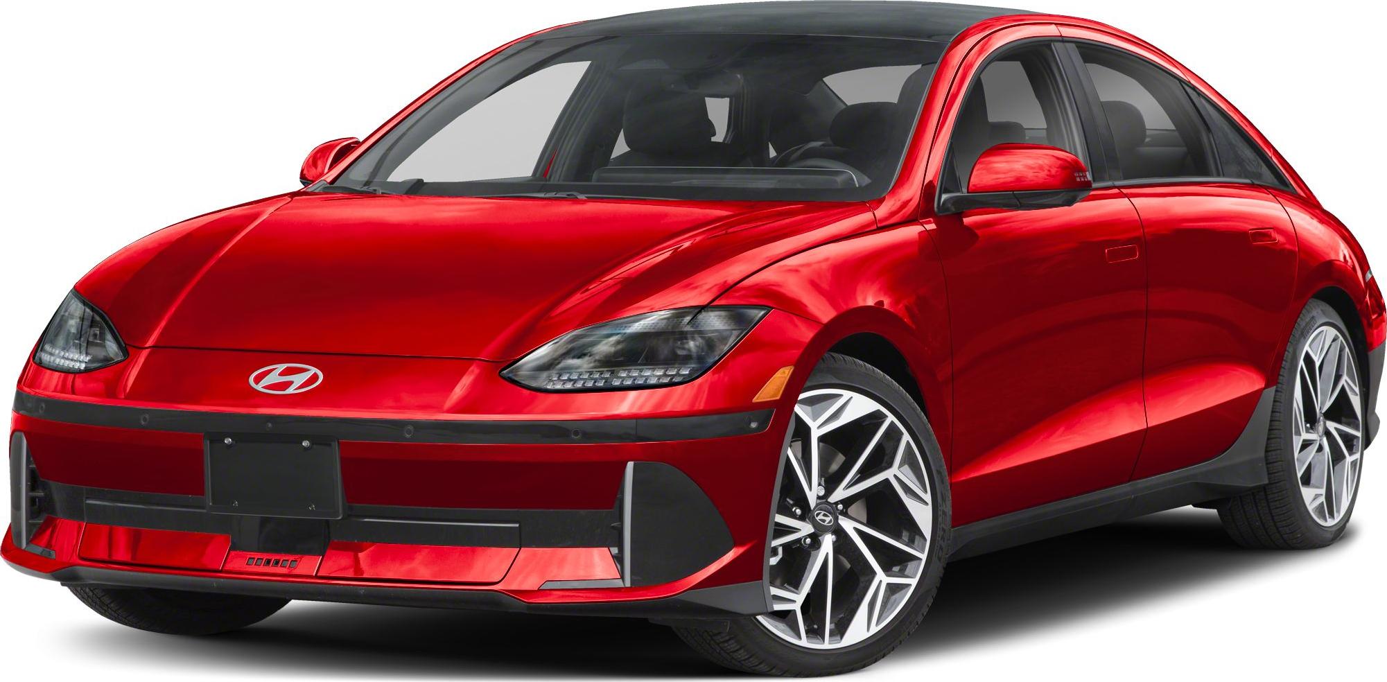 Sleek red electric sedan with LED headlights and modern alloy wheels