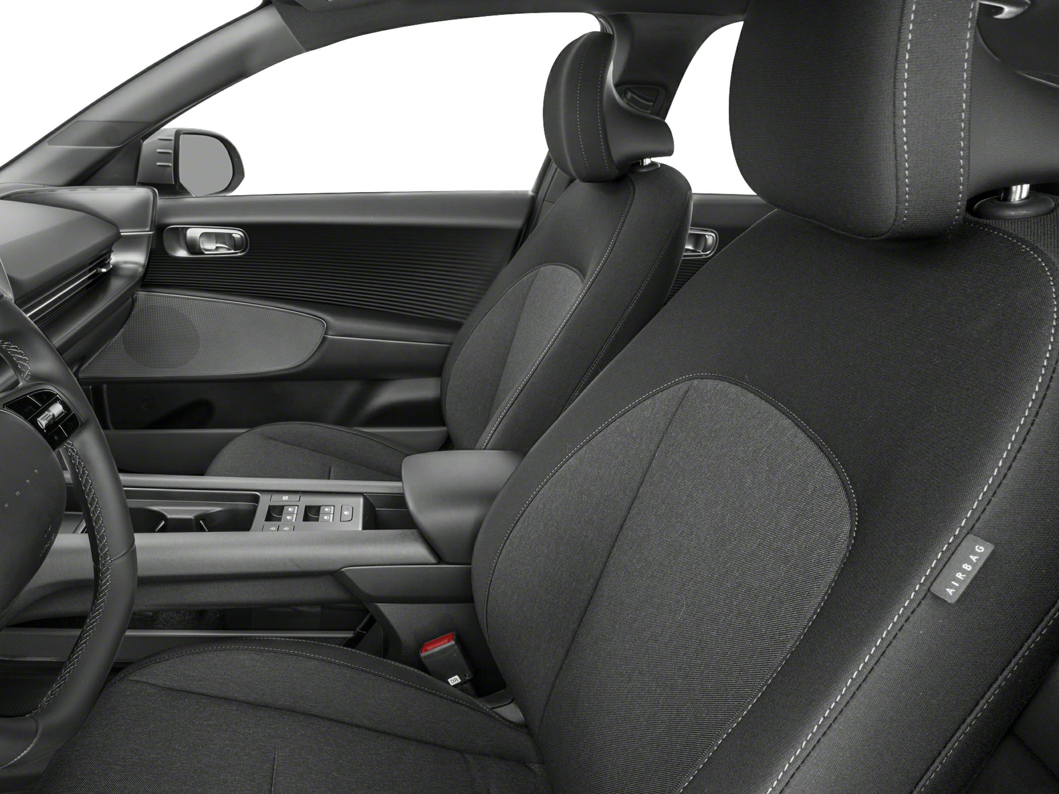 Fabric front seats with detailed stitching and modern door panel
