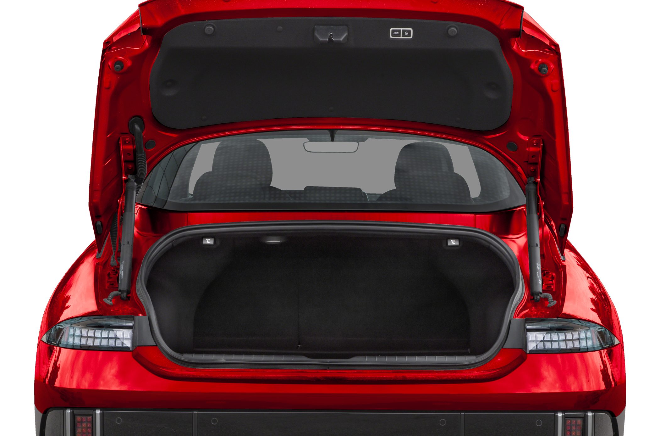Spacious open trunk and modern rear design of an electric sedan.