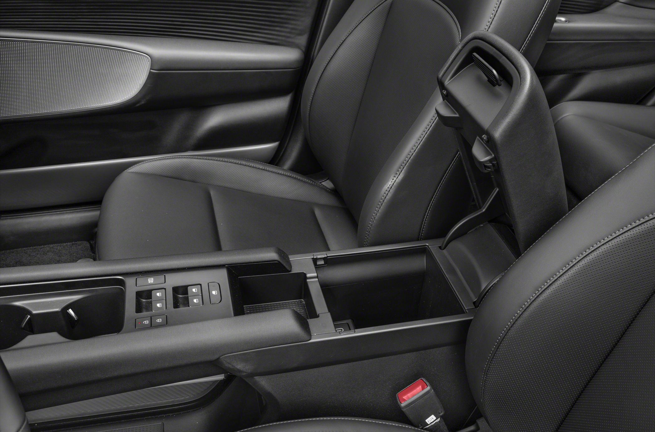 Interior center console with storage, cup holders, and door panel controls