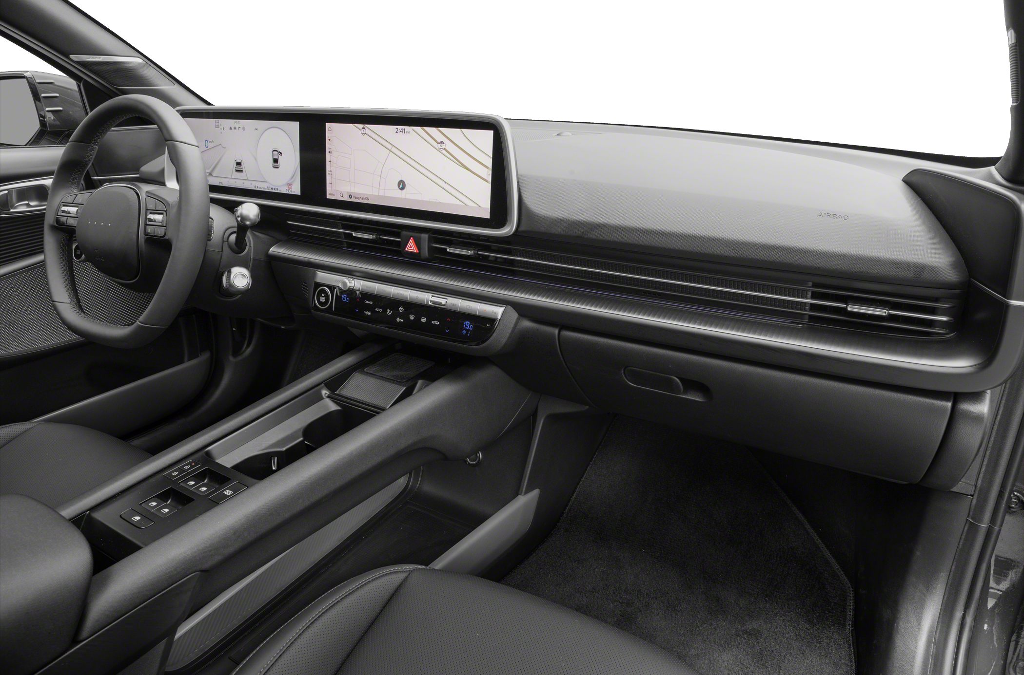 Modern dashboard with dual digital display screens and sleek control panel.