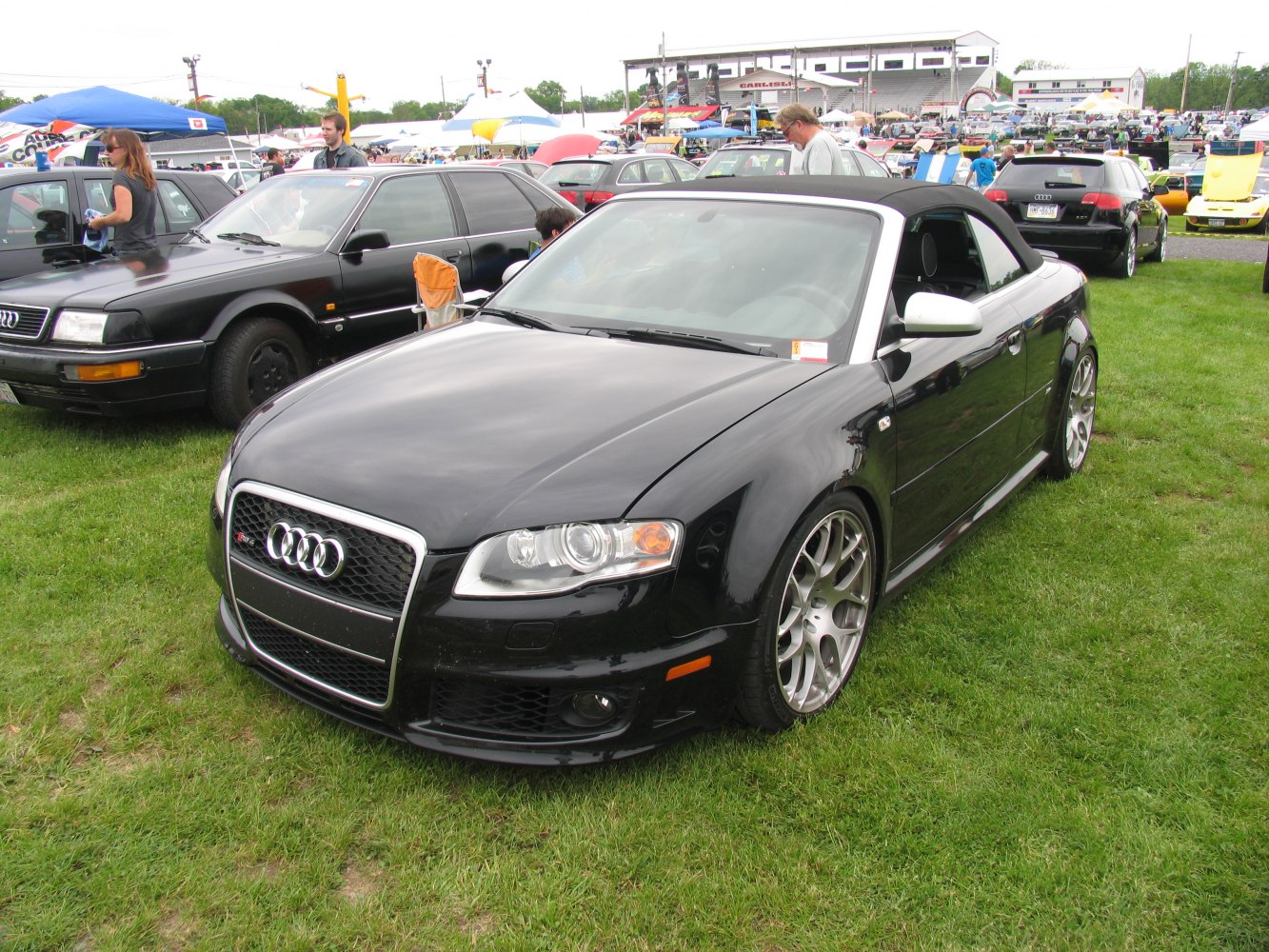 Front view showing iconic grille, headlights, and alloy wheels of sporty convertible