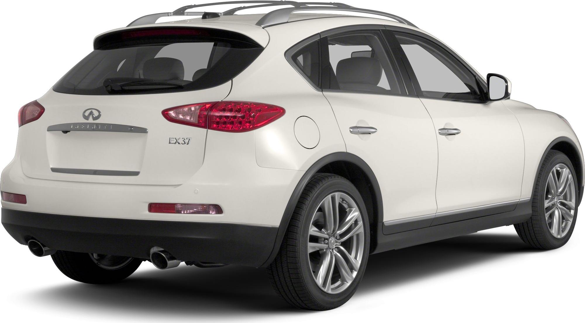 Rear side view with dual exhaust and alloy wheels