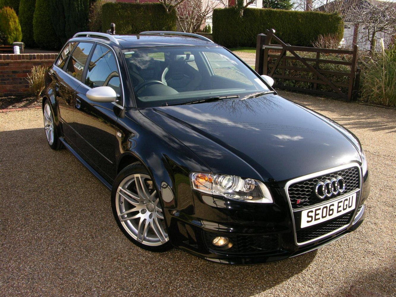 Black RS4 Avant station wagon with alloy wheels