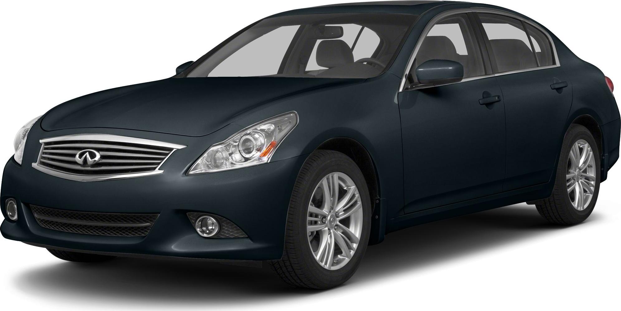 Front grille, headlight, and alloy wheel of a sedan.