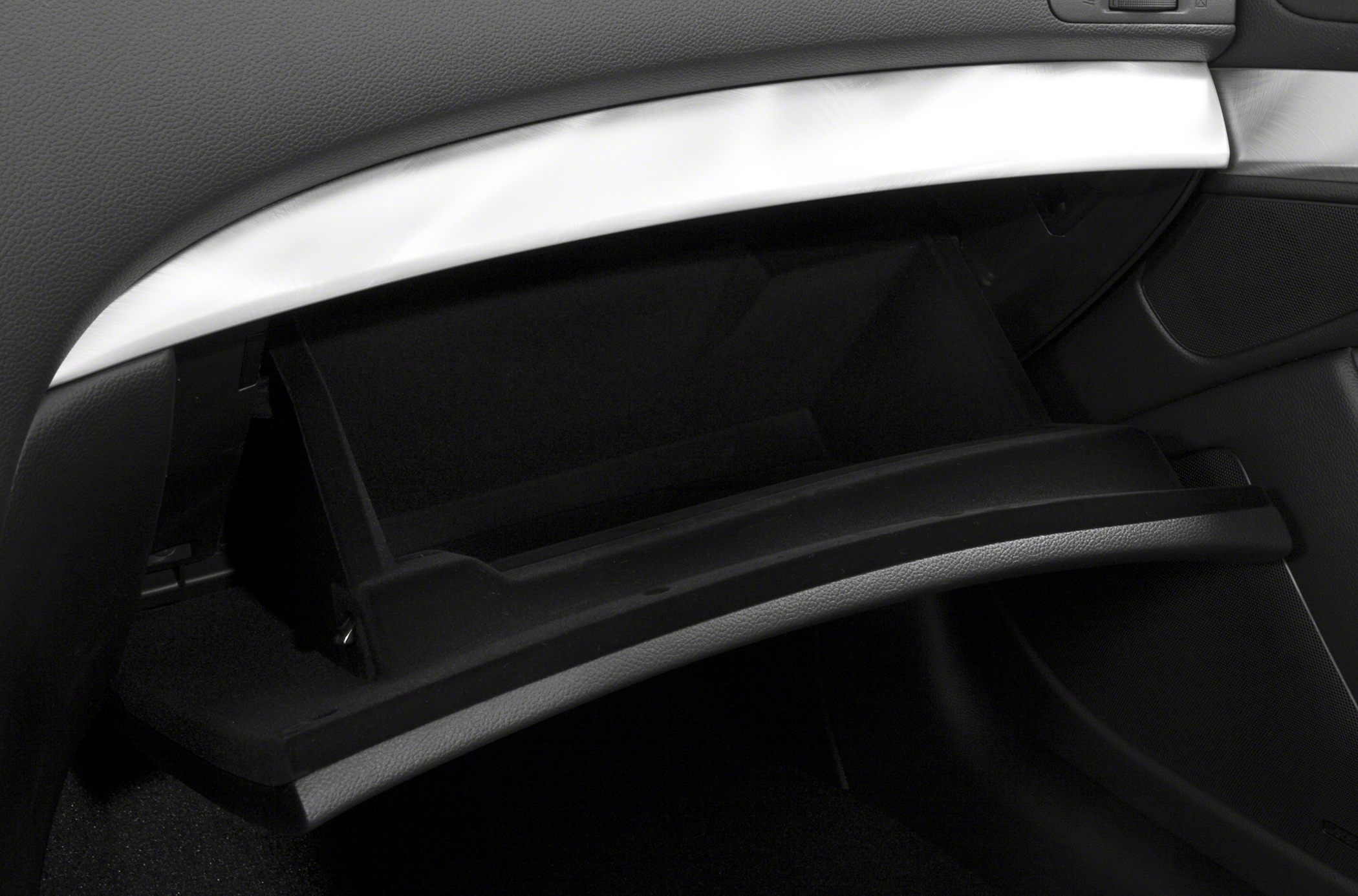 Open glove box with dashboard and interior trim