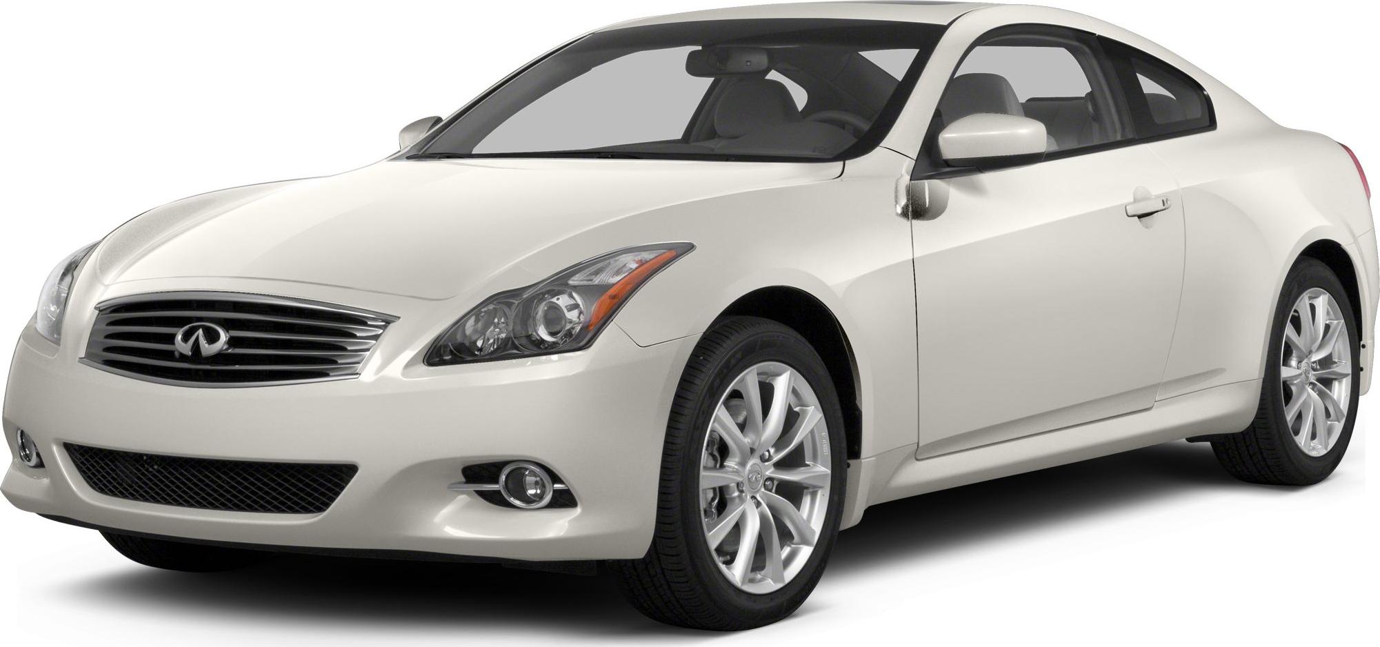 Front three-quarter view of a white coupe with sleek headlights and alloy wheels