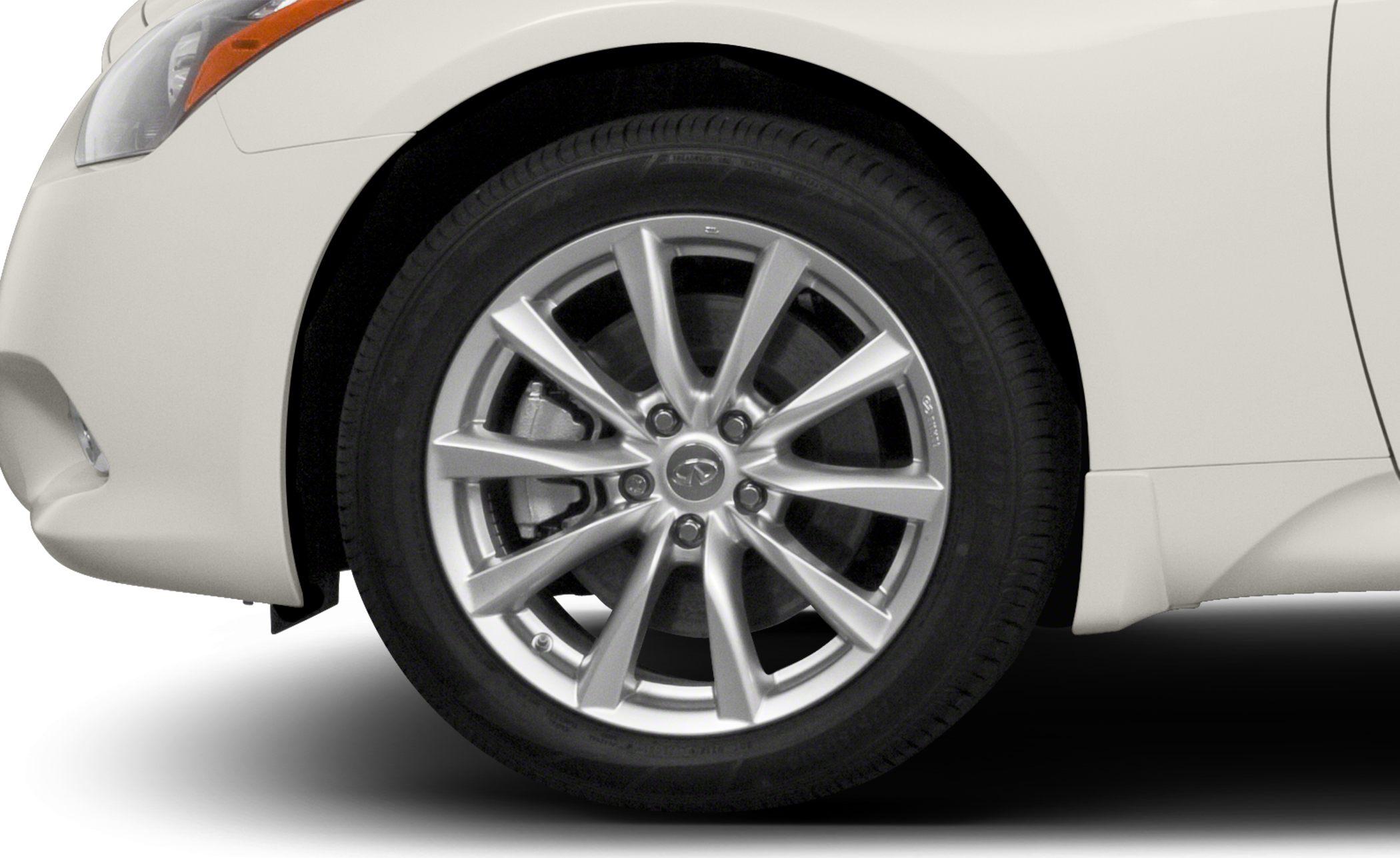 Alloy wheel with multi-spoke design and disc brake behind.