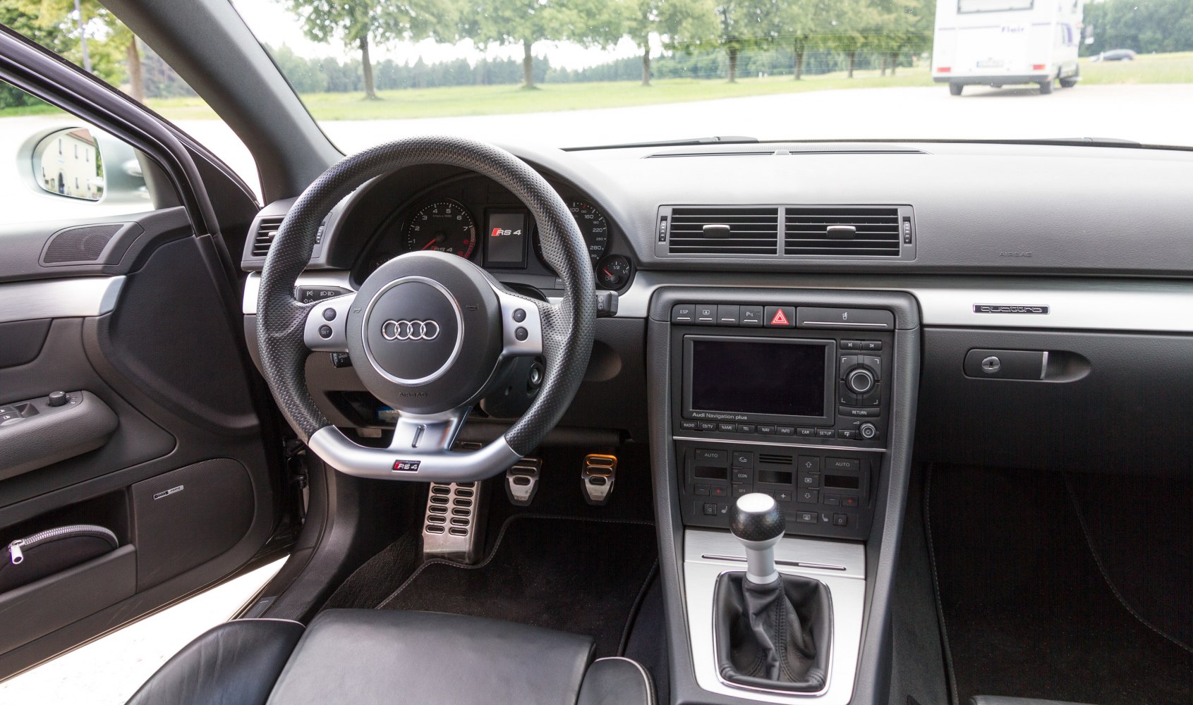 Audi RS 4 Avant interior view with steering wheel and manual gear shift